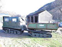 Hagglund BV206 with flatbead trailer, perfect length for carrying deer fence posts - click to enlarge