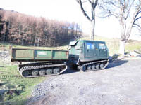 Hagglund BV206 with flatbead trailer, perfect length for carrying deer fence posts. - click to enlarge