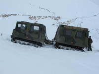 Hagglund BV206 delivering animal feed in the snow. - click to enlarge
